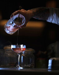 Delicious elegant orange cocktail in top bar restaurant in bogota colombia