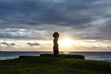 Sunset at Ahu Tahai, site with moai statues at Easter Island, Chile