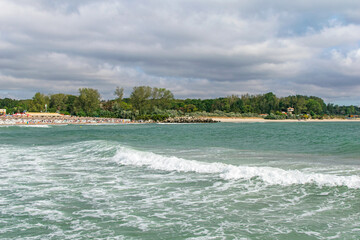 Landscape at the Black Sea, in Romania, Neptun resort. A beach in the distance and vegetation. © bogdan vacarciuc