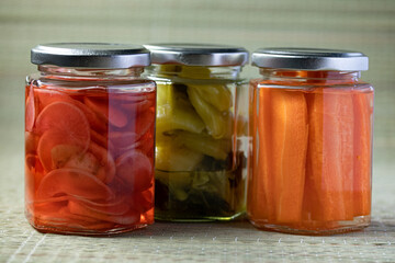 Pickled Cabbage, Pickled Reddish, Pickled Carrot in a clear glass jar