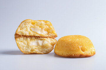 Cake stuffed with cream on a white background