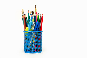 Colored photo of pencils in metal cup isolated on white background