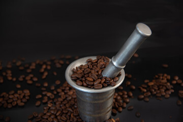 coffee beans in a mortar