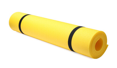 Rolled yellow camping mat isolated on white