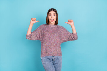 Photo of crazy egocentric lady direct thumbs herself open mouth wear knitted sweater isolated blue...
