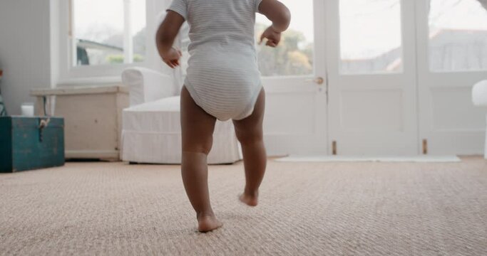 happy baby learning to walk toddler exploring home curious infant walking through house enjoying childhood