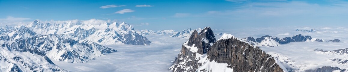 Switzerland, Panoramic view on Snow Alps and Blue Sky around Titlis mountain