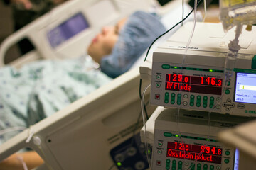 Latin Woman Resting In Hospital Bed During Labour And Delivery