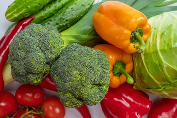 Close-up of broccoli, cabbage, tomatoes, peppers. Fresh vegetable isolated nutrition healthy. natural green.