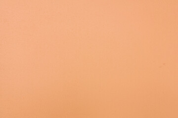 Surface orange plaster wall texture for background.