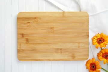 Cutting board mockup, wood chopping board mock up for engraving design presentation or text, flat lay composition with yellow flowers.