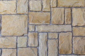 Wall covered with decorative stones