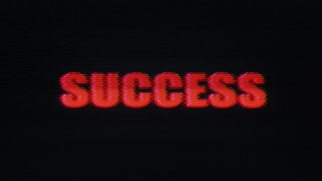 Glitchy Success text message on distorted vintage screen - retro CRT cathode ray tube VHS VCR Gaming 80s technology concept