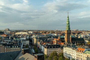 Fototapeta na wymiar Copenhagen, Denmark. September 27, 2019: Nikolaj Center for Contemporary Art and St. Nicholas Church. City View.