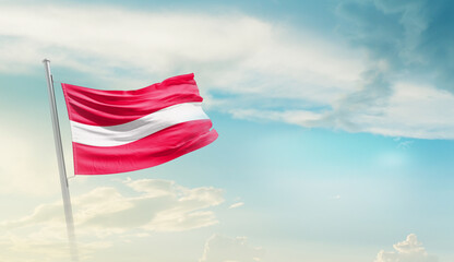 Latvia national flag cloth fabric waving on the sky - Image