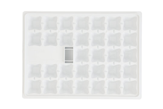 Plastic tray for producing ice cubes in the freezer of the refrigerator, white background