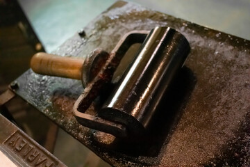 Ink roller, wet with ink for letterpress