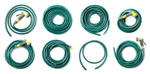 Set with green rubber watering hoses on white background, top view. Banner design - obrazy, fototapety, plakaty