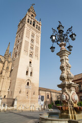 Obraz premium The famous bell tower of the cathedral of Seville, Andalusia, Spain, named 