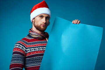 Cheerful man in a christmas blue mockup Poster isolated background