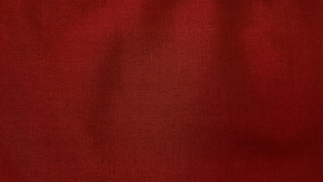 red fabric background. close up texture of red fabric or jersey pattern use as banner and background.