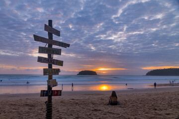 Tourist enjoy the sunset at  Phuket Thailand-July 14 2021:  Karon beach during the Covid19 pandemic.