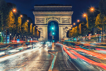 Arc De Triomphe in Paris city by night - obrazy, fototapety, plakaty