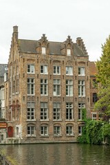 Fototapeta na wymiar Brussels, Belgium. September 29, 2019: Bruges canals landscape and house architecture.
