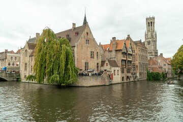 Brussels, Belgium. September 29, 2019: Bruges canals landscape and house architecture.