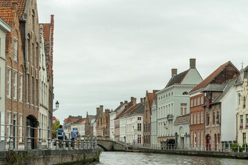 Fototapeta na wymiar Brussels, Belgium. September 29, 2019: Bruges canals landscape and house architecture.