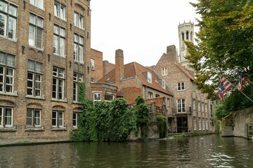Brussels, Belgium. September 29, 2019: Bruges canals landscape and house architecture.