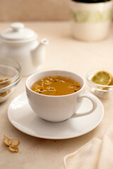 Obraz na płótnie Canvas Cup of tea. Warm delicious cup of refreshing herbal tea.