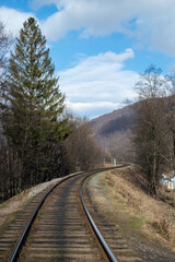 Fototapeta premium Railroad winding in the mountains. mountains landscape. 
