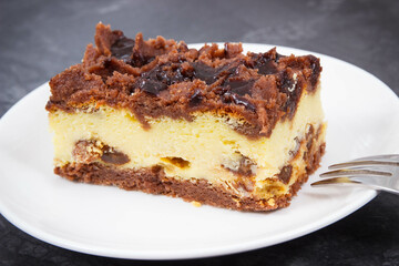 Piece of fresh cheesecake on plate. Delicious dessert