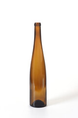 brown glass bottle standing on white background