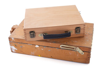 Wooden artist easel box isolated at white background. Wood painter case