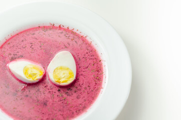 Beetroot red soup, borscht. Traditional Ukrainian, Polish or  Russian borscht with sour cream and boiled egg