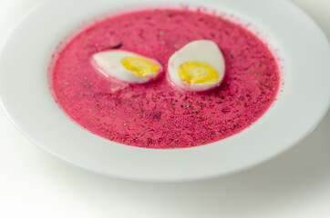 Beetroot red soup, borscht. Traditional Ukrainian, Polish or  Russian borscht with sour cream and boiled egg
