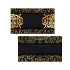 Black business card template with golden Indian ornament