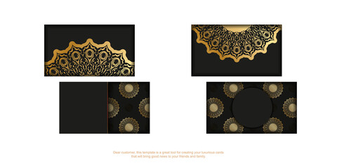 Black business card template with golden vintage ornament