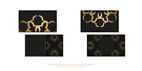 Black business card with golden mandala pattern