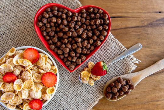 Cornflakes set. Cereals for breakfast. Cornflakes with strawberry.