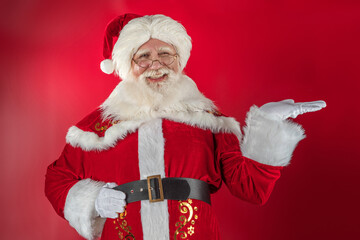 Emotional senior male model old man with a natural white beard Father Christmas