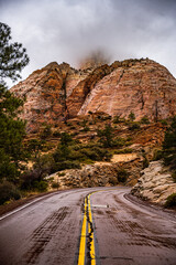 Rock Face Swallowed By Fog Moving In