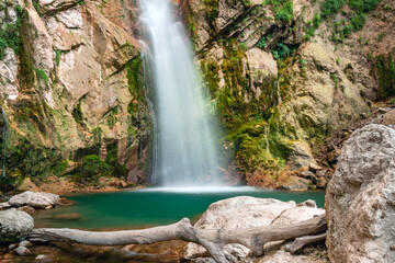 Fototapeta na wymiar Beautiful waterfall in Julian Alps