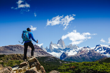 Active man hiking in the mountains. Patagonia, Mount Fitz Roy - obrazy, fototapety, plakaty