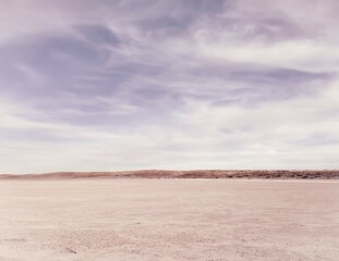clouds over the desert dunes