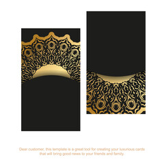 Business card in black with golden indian ornaments
