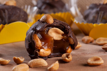 A type of brigadeiro called Charge, with dulce de leche and peanuts. Party candy.