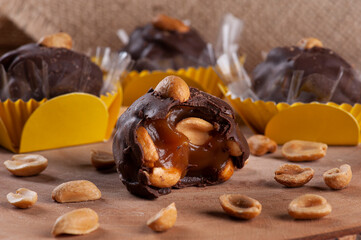 A type of brigadeiro called Charge, with dulce de leche and peanuts. Party candy.